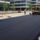 Асфальтирование территории рядом с офисами
